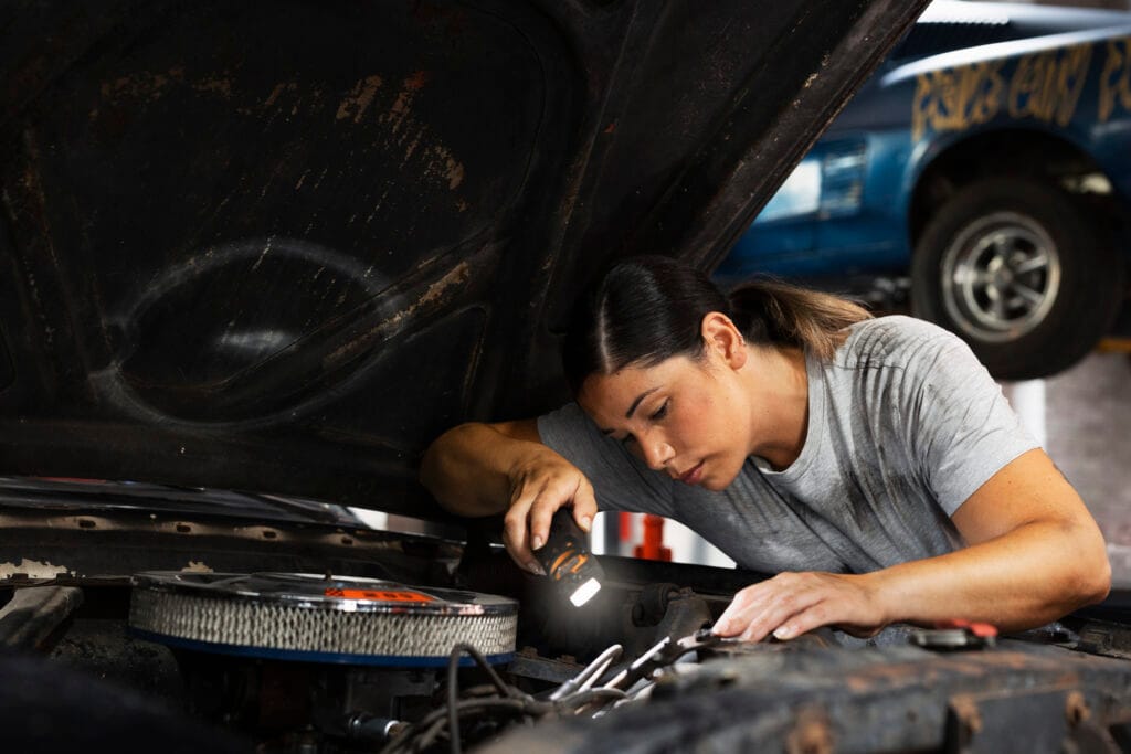 Mechanic is busy repairing car issues